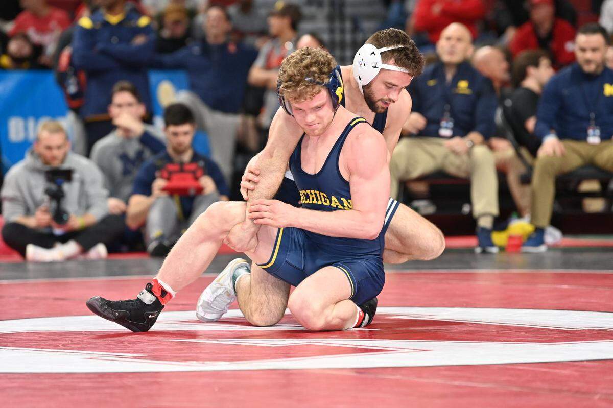 Penn State’s Brady Berge attempts to keep Michigan’s Will Lewan from escaping in their 157-pound semifinals match of the Big Ten Championships on Saturday, March 5, 2022 in Lincoln, Neb. Lewan edged Berge, 3-1, in sudden victory.