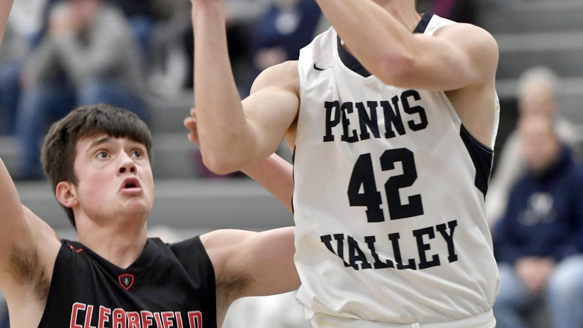 Penns Valley’s Cam Shaffer looks to the basket ahead of Clearfield’s Cade Walker during the game on Wednesday, Jan. 9, 2019.
