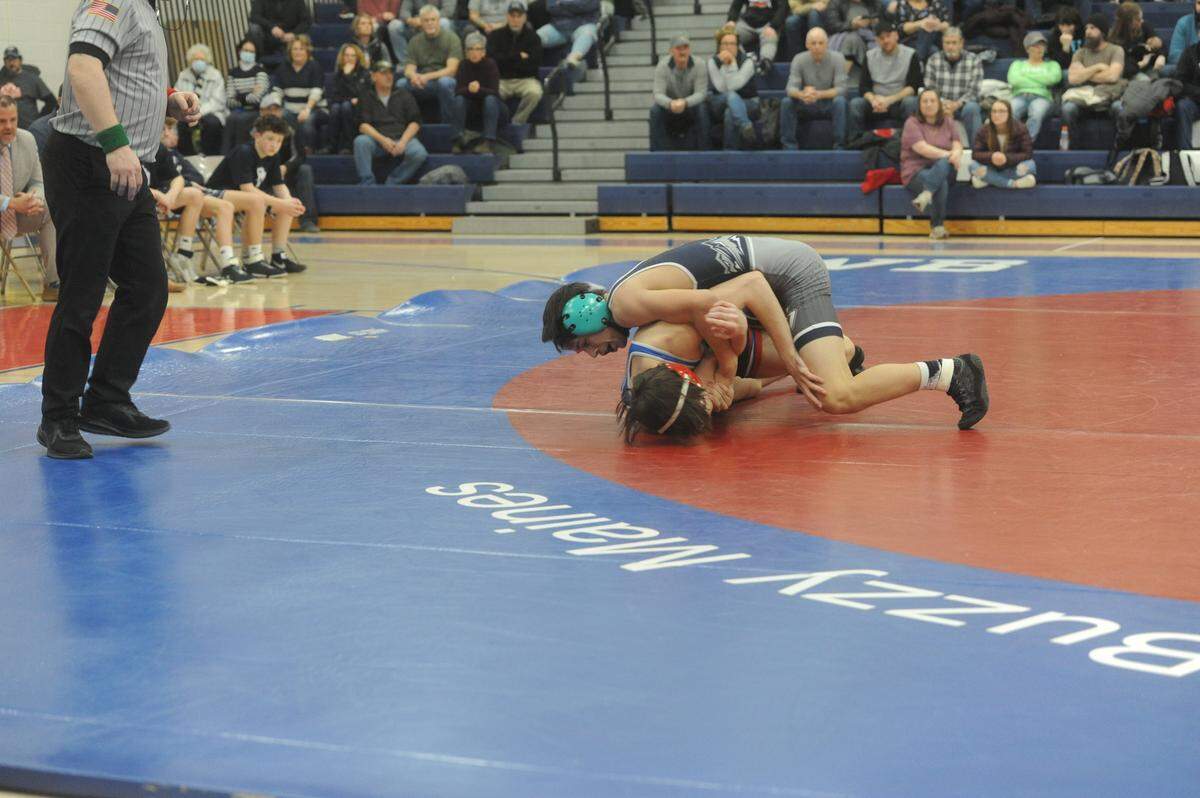 Philipsburg-Osceola’s Marcus Gable looks for some nearfall points on West Branch’s Aaron Myers during their 145-pound bout of the Mounties’ 54-18 win on Feb. 8, 2022. Gable pinned Myers in 1:17.