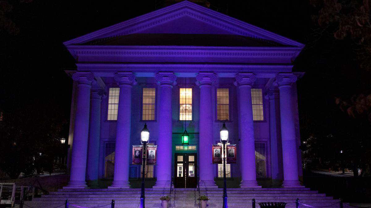 The Centre County Courthouse in Bellefonte is illuminated with purple lights for Domestic Violence Awareness Month.