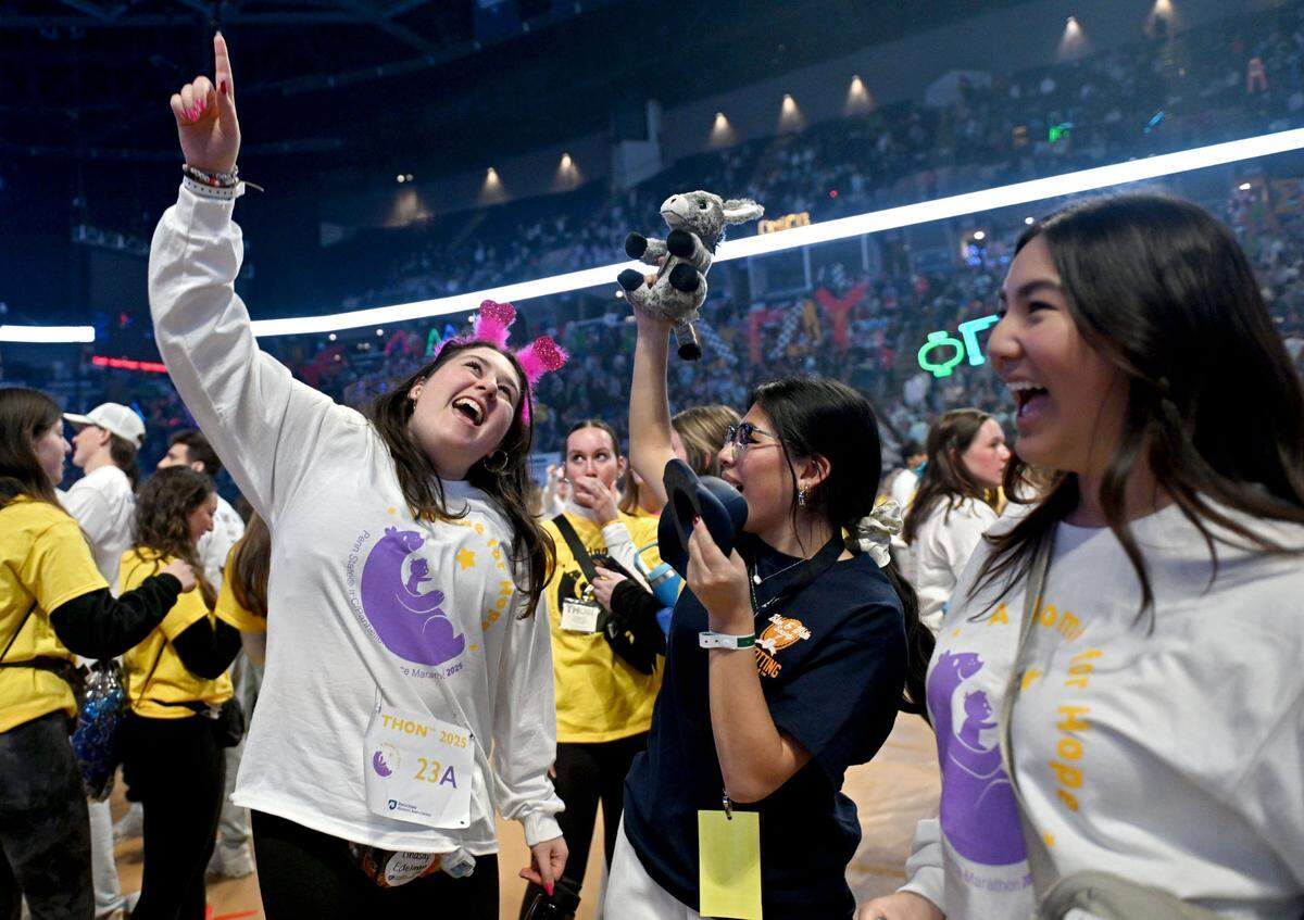 Lindsay Edelman, Karina Quinn and Elizabeth Chin dance and sing together during Penn State Thon on Friday, Feb. 21, 2025.