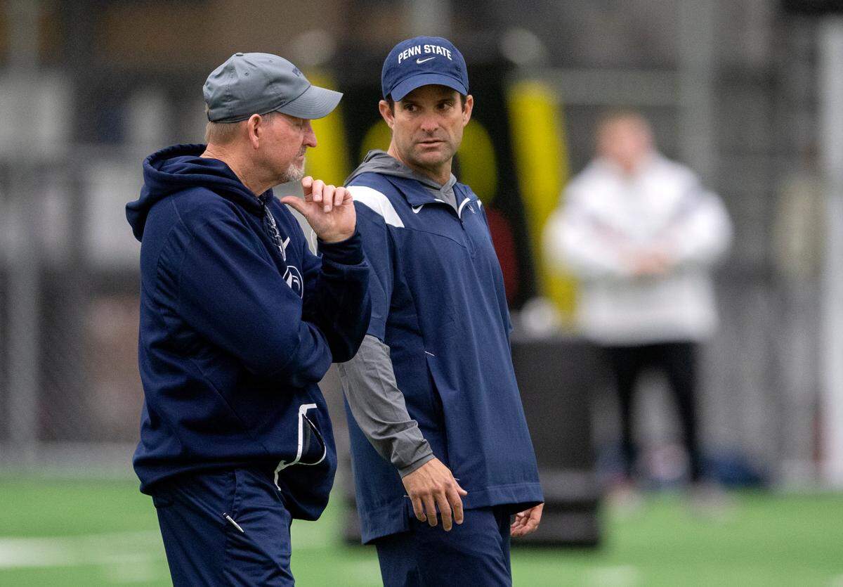 Newly hired defensive coordinator Manny Diaz watches Penn State football practice on Friday, Dec. 17, 2021.