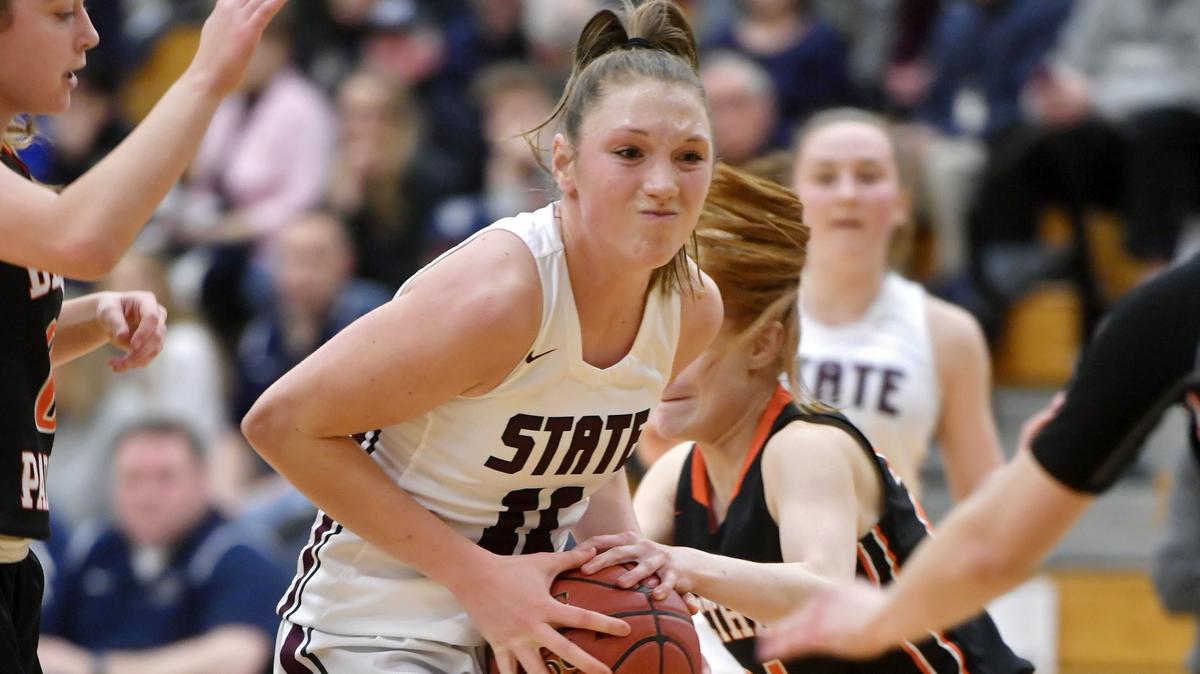 State College’s Maya Bokunewicz tries to fight through Bethel Park defenders during the game on Friday, March 8, 2019.