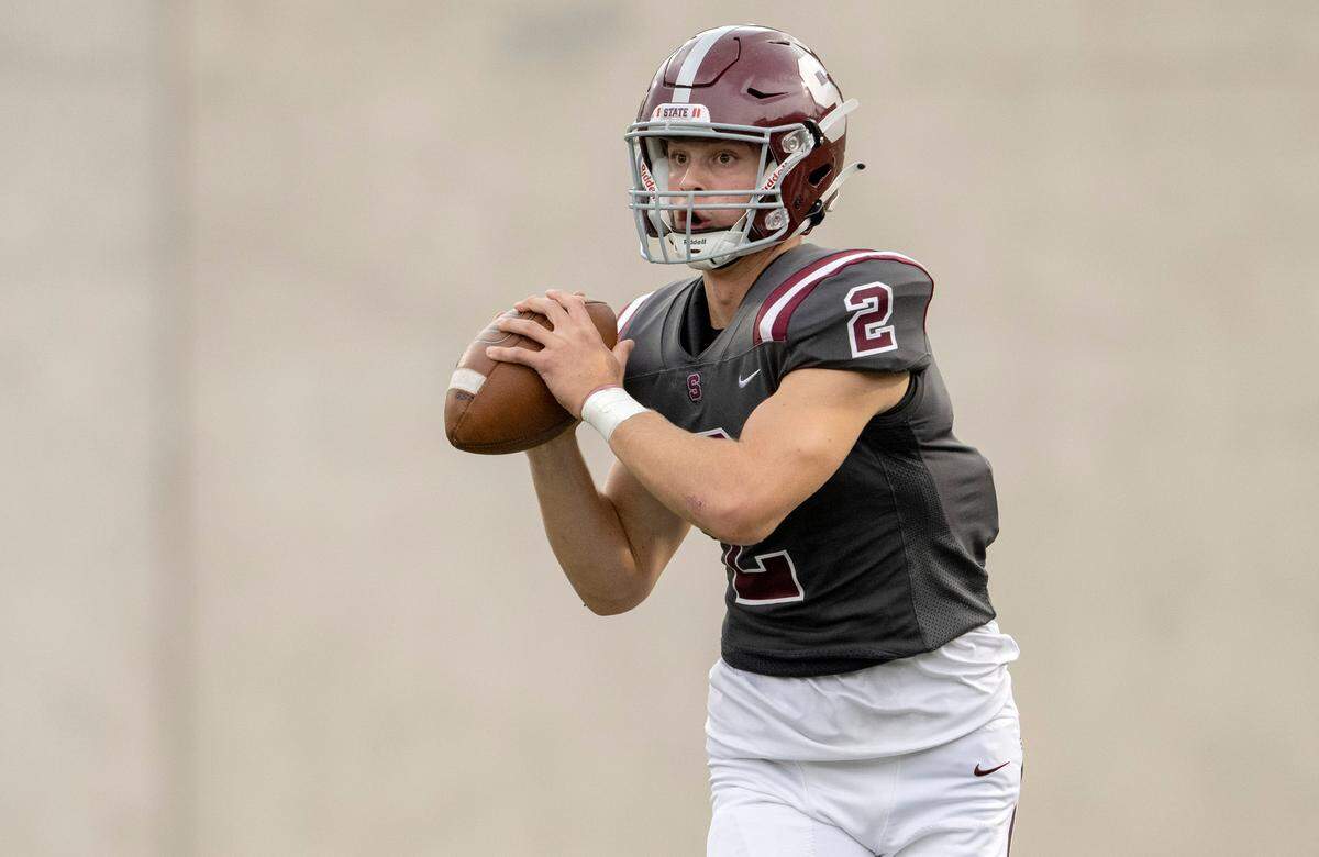 State College’s Finn Furmanek looks to make a pass during the game against Williamsport on Friday, Aug. 26, 2022 at Memorial Field.