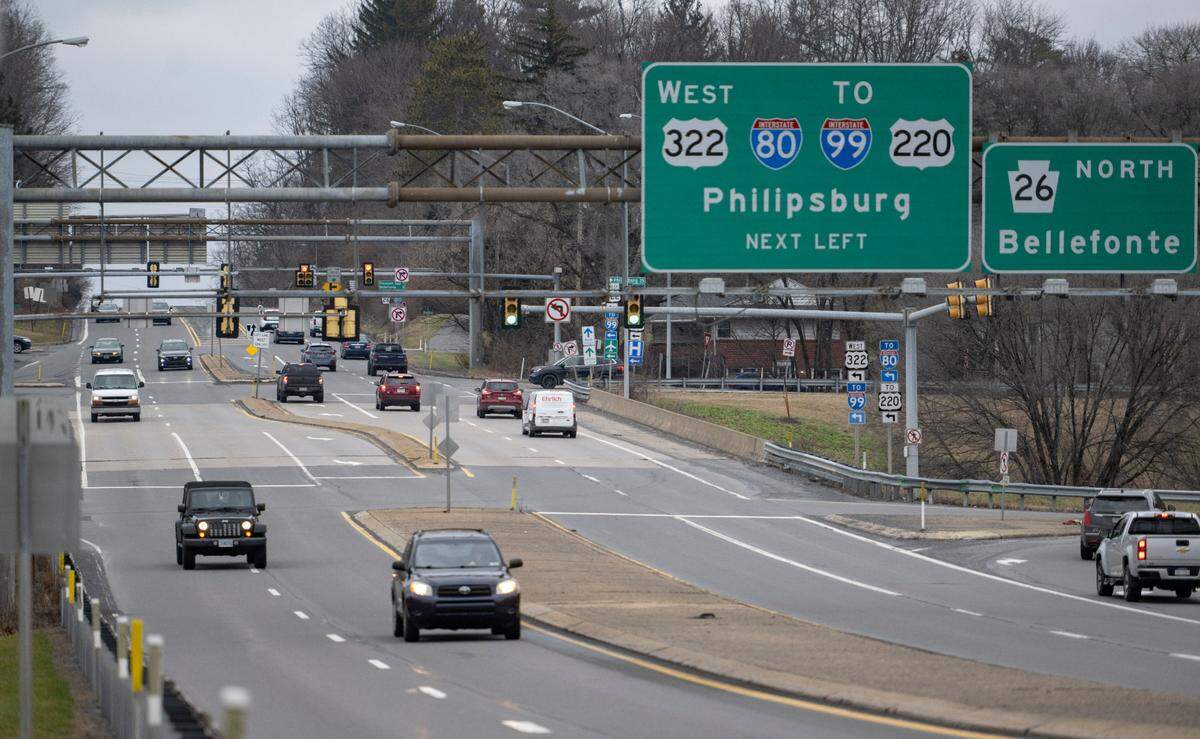 Traffic travels along state Route 26 Tuesday near the ramps for U.S. Route 322. College Township has received funding to help in this area.