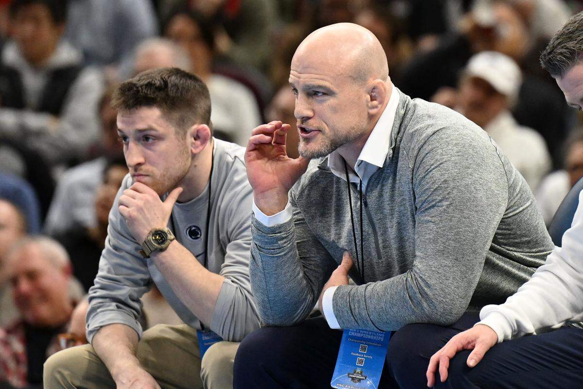 Penn State wrestling coach Cael Sanderson yells to Josh Barr during his championship match in the NCAA wrestling championships on Saturday, March 21, 2026.  