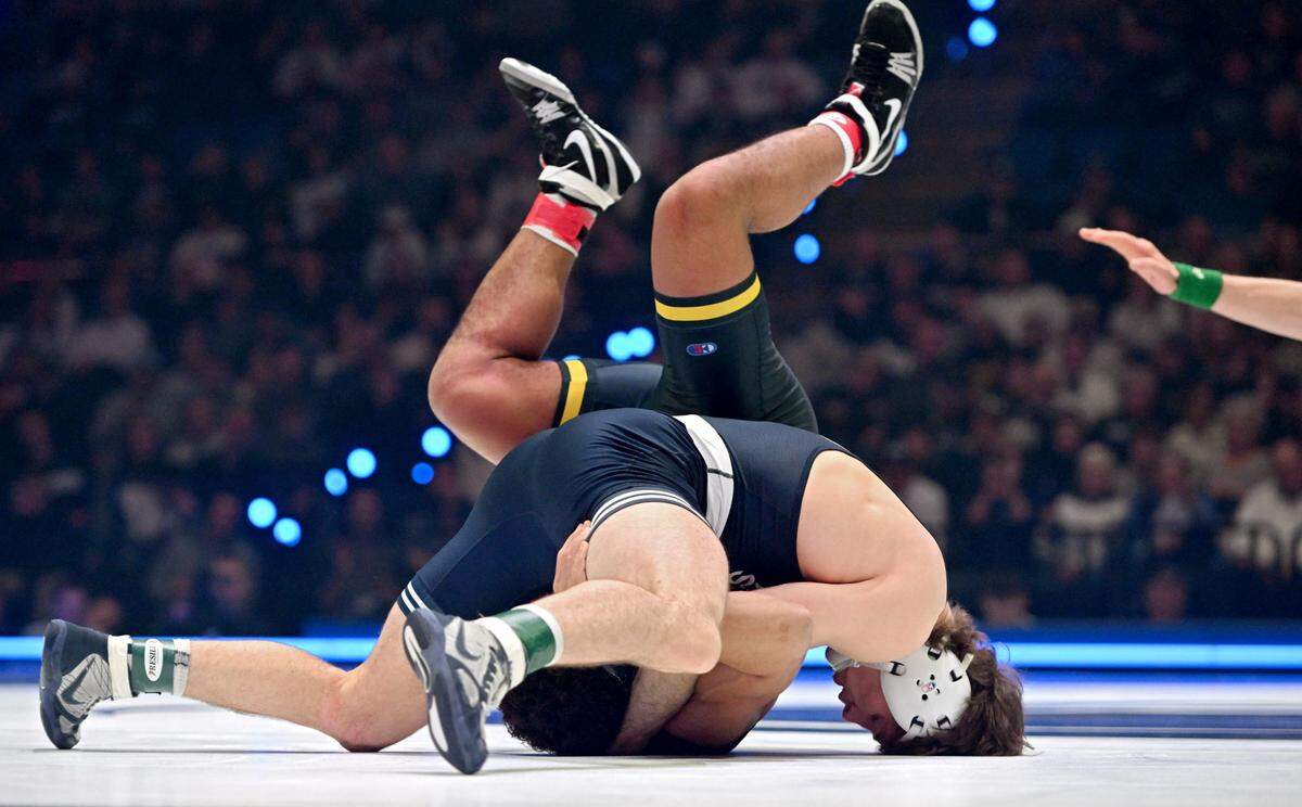 Penn State’s Levi Haines controls Michigan’s Joseph Walker in the 174 lb bout of the match on Friday, Feb. 7, 2025 in the Bryce Jordan Center. Haines won by fall at 2:36.