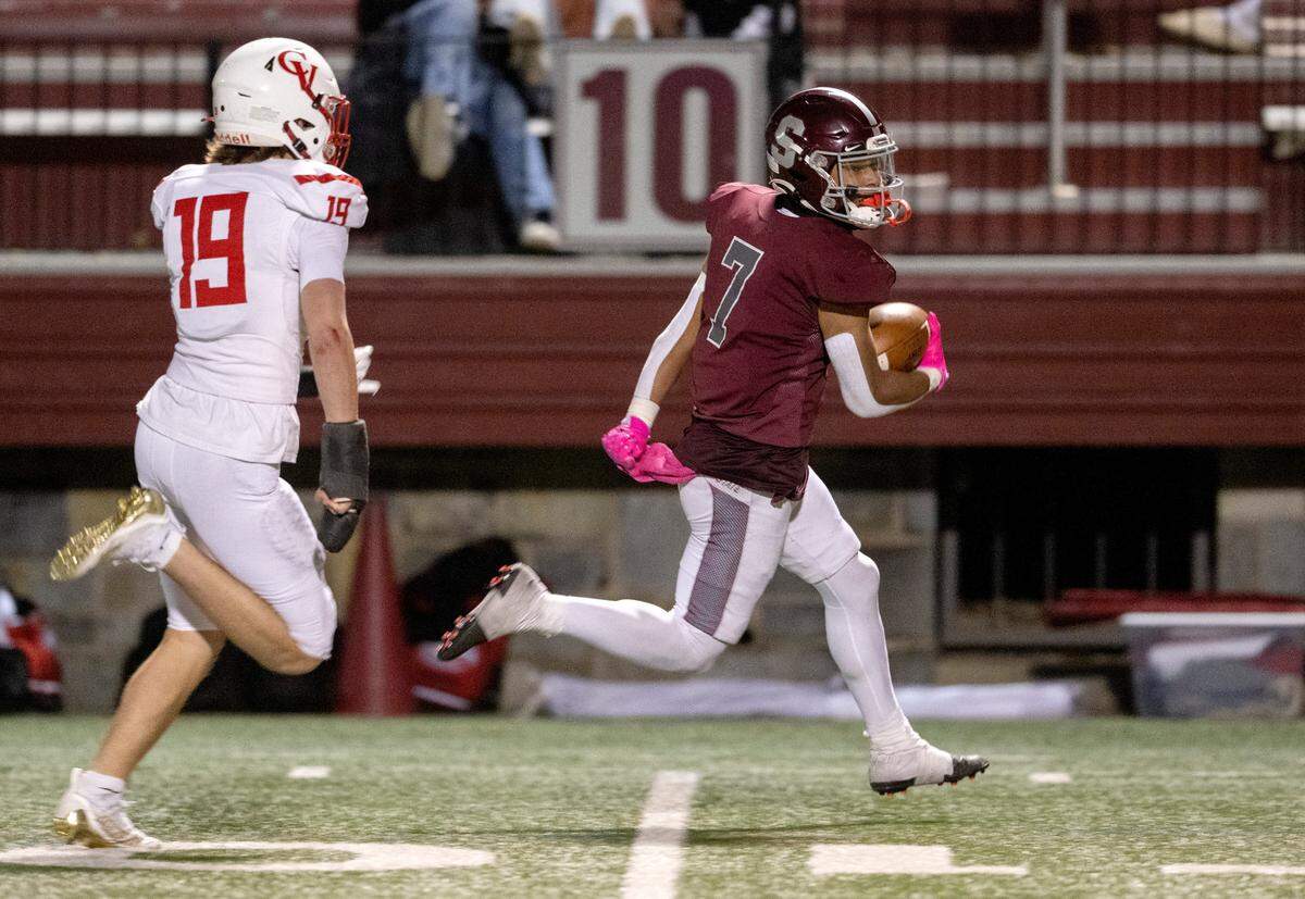 Cumberland Valley’s Gavin Kendrick can’t stop State College’s D’antae Sheffey as he runs for a touchdown during the game on Friday, Oct. 21, 2022 at Memorial Field.