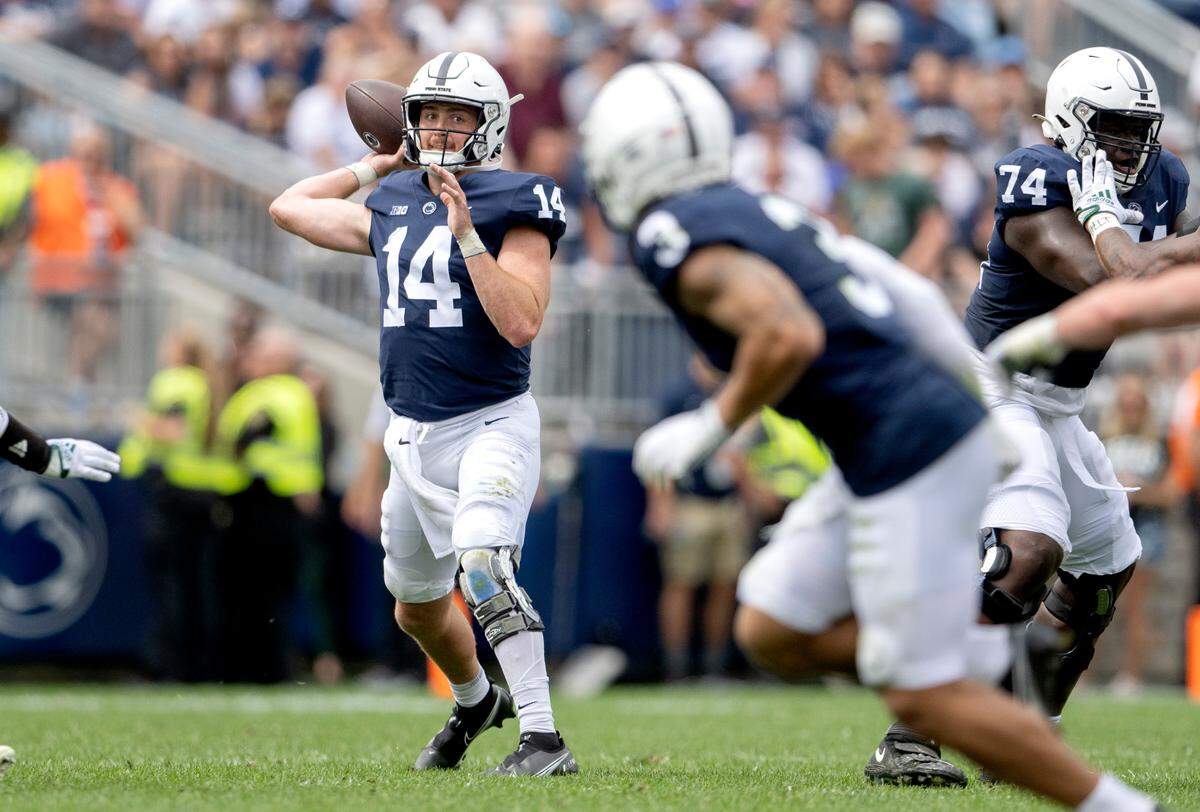 Penn State quarterback Sean Clifford makes a pass to wide receiver Parker Washington during the game against Ohio on Saturday, Sept. 10, 2022.