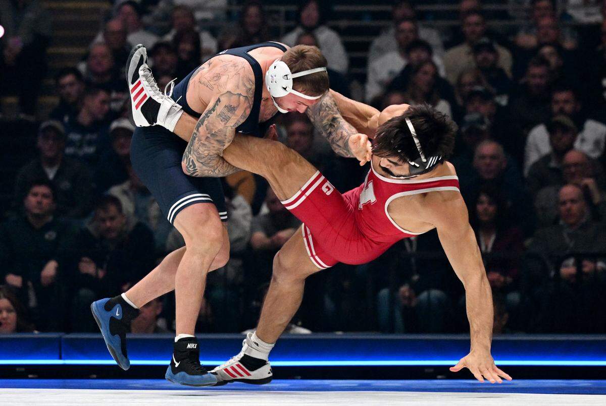 Penn State’s Rocco Welsh trips up Nebraska’s Silas Allred in the 184 lb bout of the match on Friday, Jan. 30, 2026.