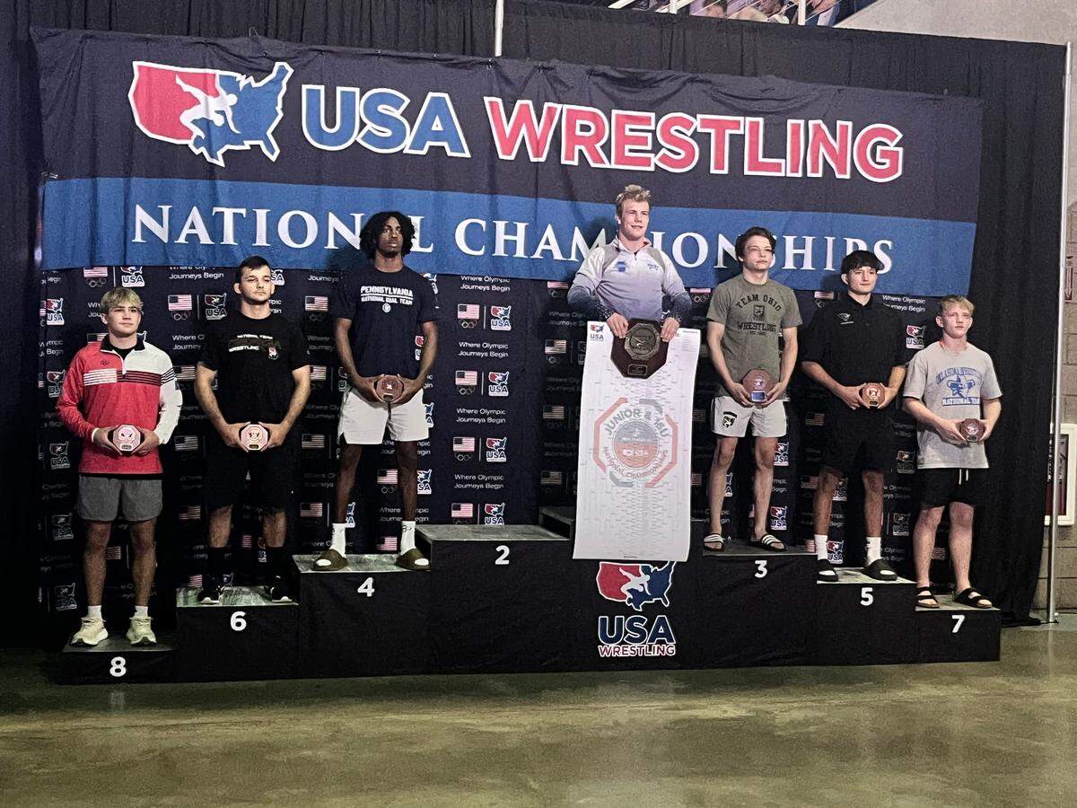 State College’s Pierson Manville celebrates winning the 144-pound title of the Junior Men Division of Greco-Roman in the USMC/USAW Junior National Championships in Fargo, ND. Manville also earned a fourth-place finish in Freestyle.