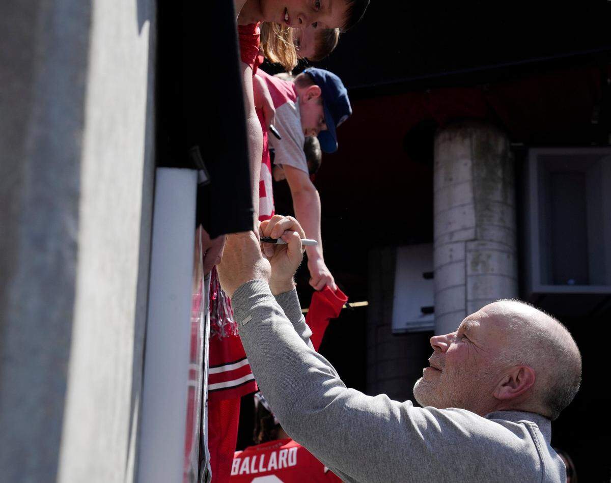 April 15, 2023; Columbus, Ohio, USA;  Defensive coordinator Jim Knowles signs autographs for fans following the Ohio State spring football game Saturday at Ohio Stadium.Mandatory Credit: Barbara J. Perenic/Columbus DispatchOhio State Spring Game Bjp 57