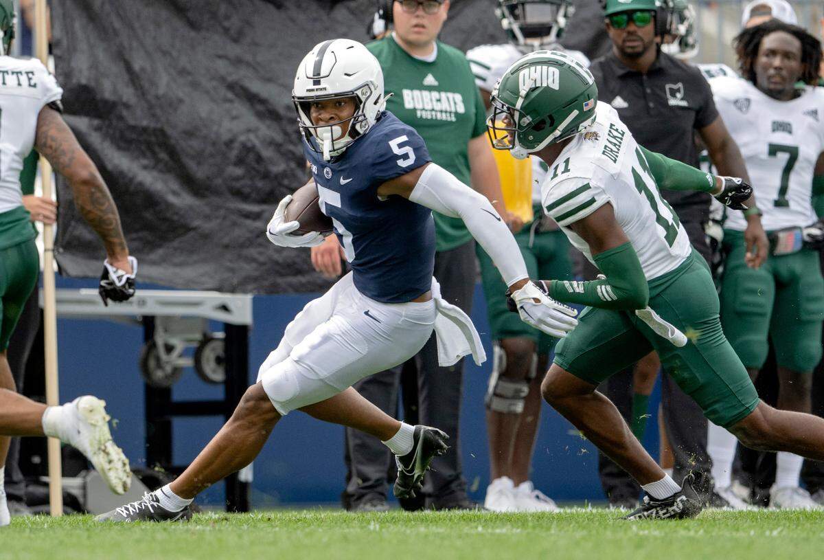 Penn State wide receiver Mitch Tinsley cuts down the field with the ball from Ohio defenders during the game on Saturday, Sept. 10, 2022.