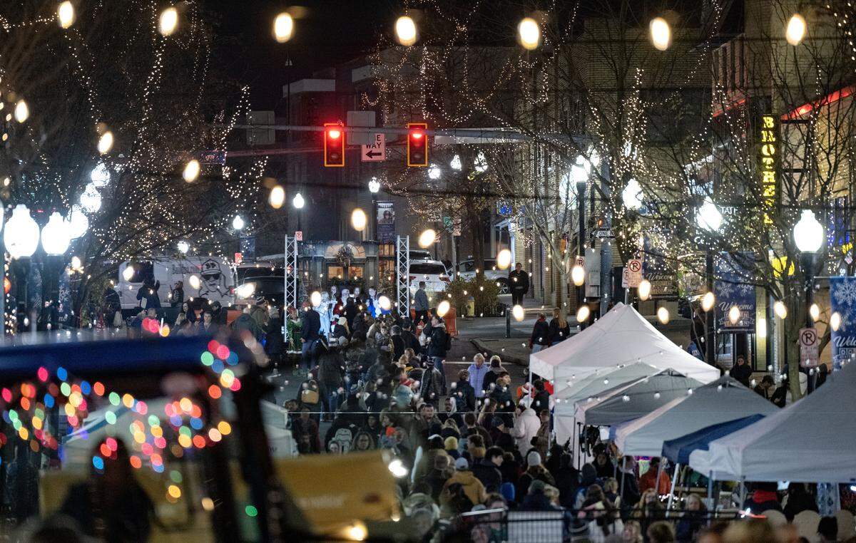 People fill Allen Street to see Santa and shop vendors during Light Up Night on Thursday, Nov. 20, 2025. 