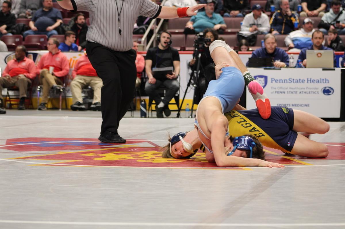 Bald Eagle Area’s Coen Bainey scrambles with Burrell’s Cooper Hornack in their 120-pound third-place match of the PIAA Class 2A Championships on Saturday, March 12, 2022 at Giant Center in Hershey. Bainey topped Hornack, 1-0.