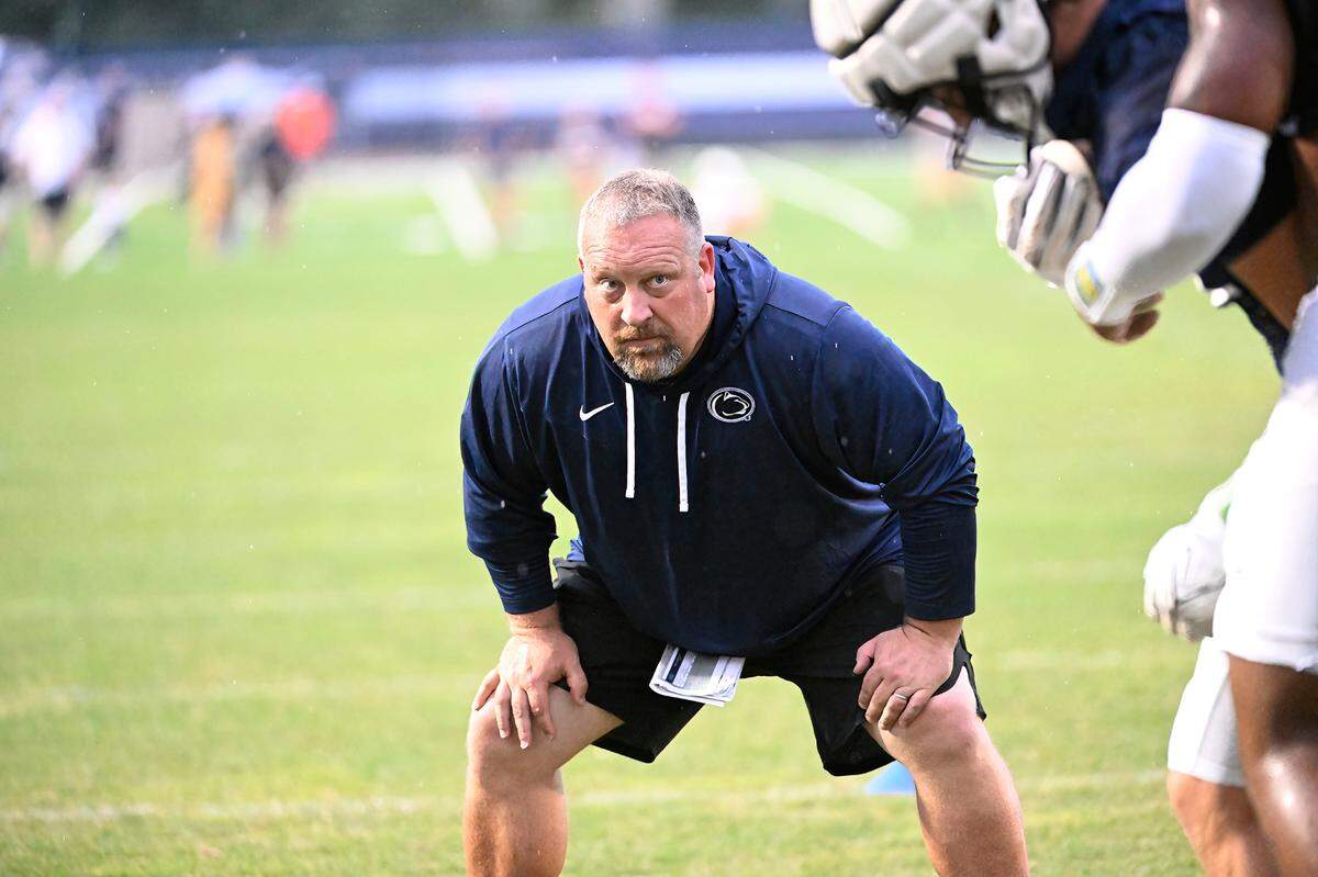 Penn State special teams/outside linebacker coach Stacy Collins looks on during Penn State’s open football practice at the Lasch practice field Saturday, Aug. 12, 2023.