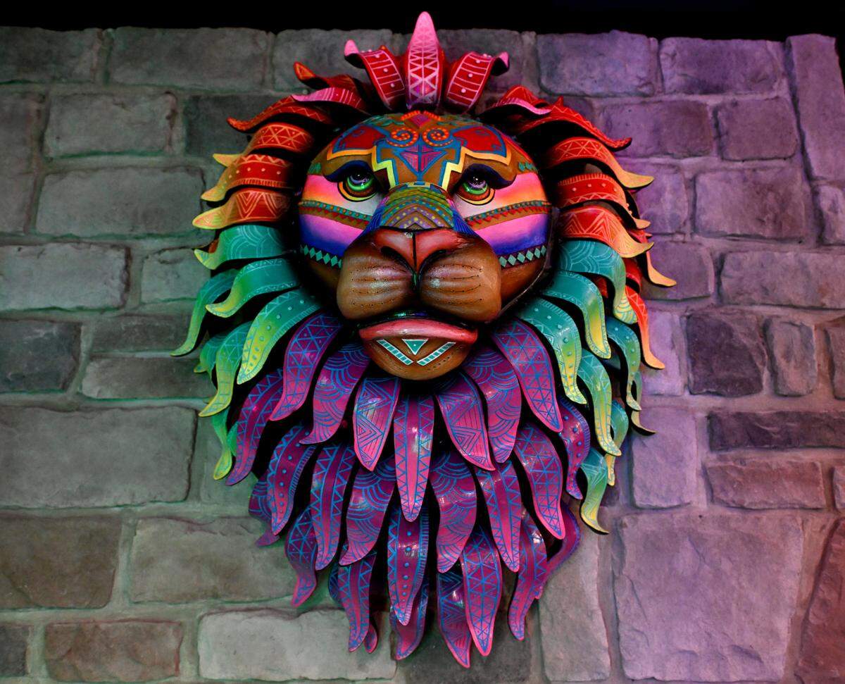 A colorful lion hangs on the wall at The Hideaway in downtown State College on Monday, Feb. 10, 2025.