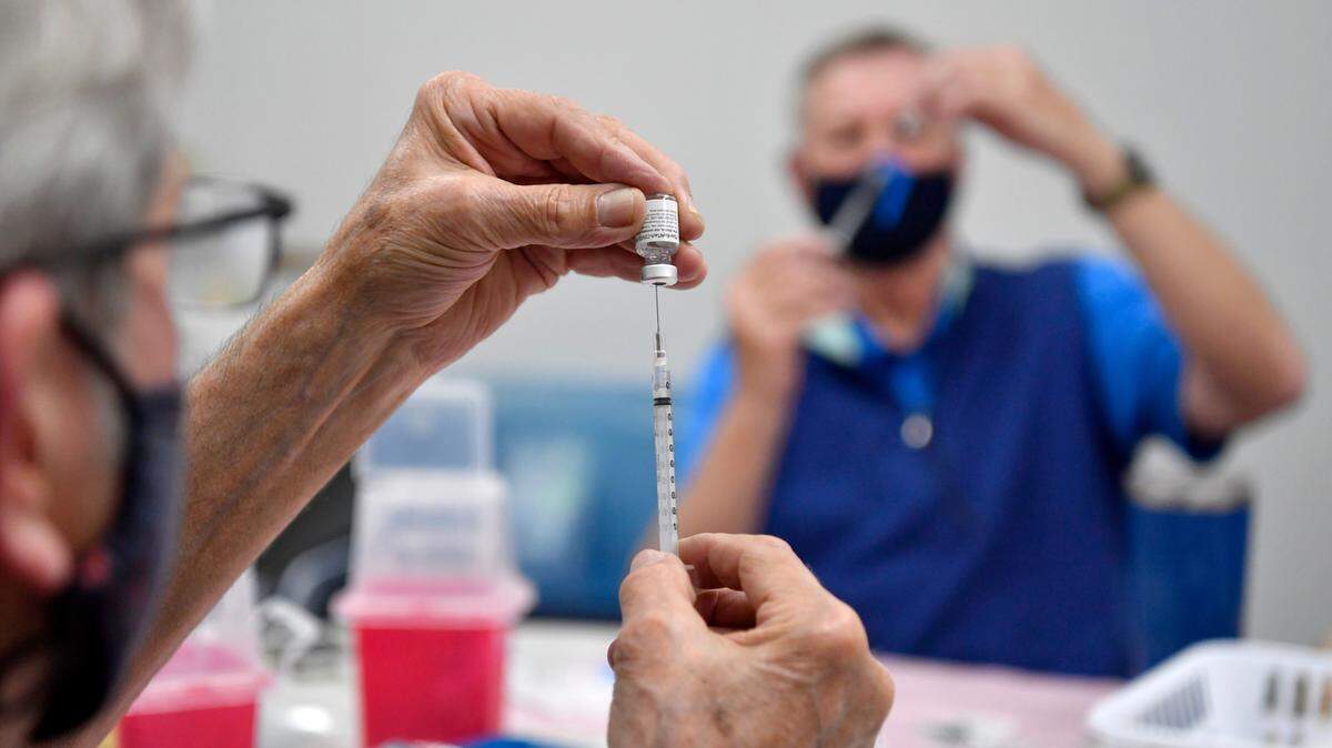 Al Jones draws Pfizer coronavirus vaccine for patients at a Centre Volunteers in Medicine vaccine clinic on May 13, 2021 at Panorama Village. CVIM does not plan to hold vaccine clinics for children under 5 once the Pfizer vaccine is approved for that age group.
