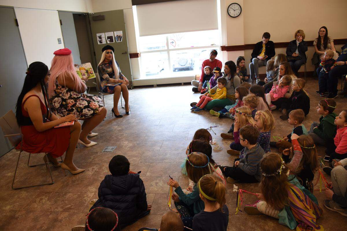Members of State College Queens read stories promoting inclusivity and LGBTQ pride to kids of all ages on Saturday during Drag Queen Story Hour at Schlow Centre Region Library.