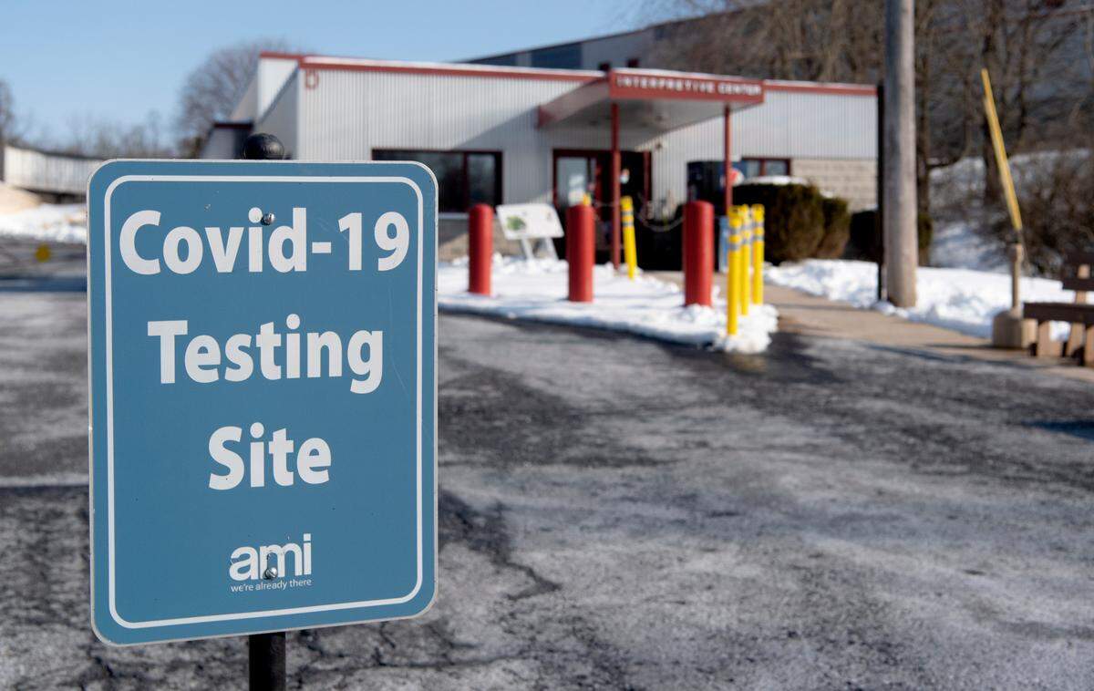 Signs for the AMI Centre County COVID-19 testing site at the Centre County Recycling and Refuse Authority Interpretive Center on Wednesday.