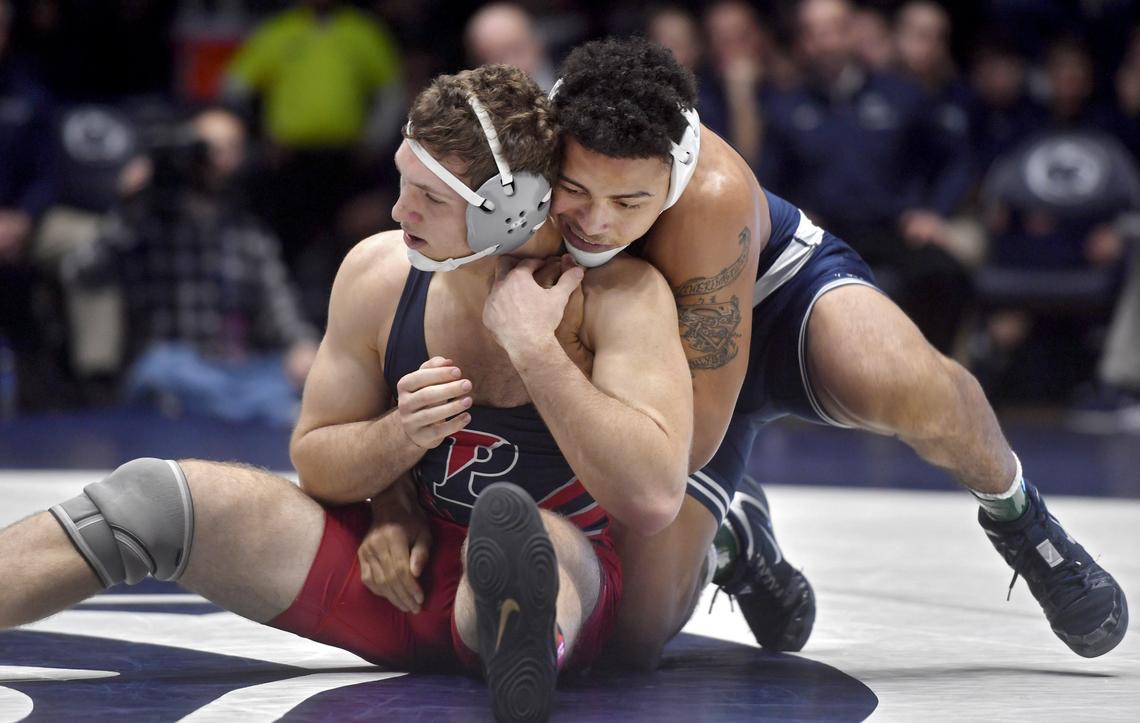 Penn State’s Aaron Brooks controls Penn’s Jese Quatse in the 184 lb bout during the match on Sunday, Dec. 8, 2019. Brooks won by tech fall.