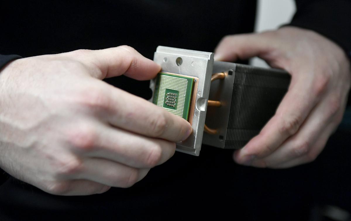 Roman Nekrasov works with a computer processor and heat sink at South Hills School of Business and Technology in State College on April 9.