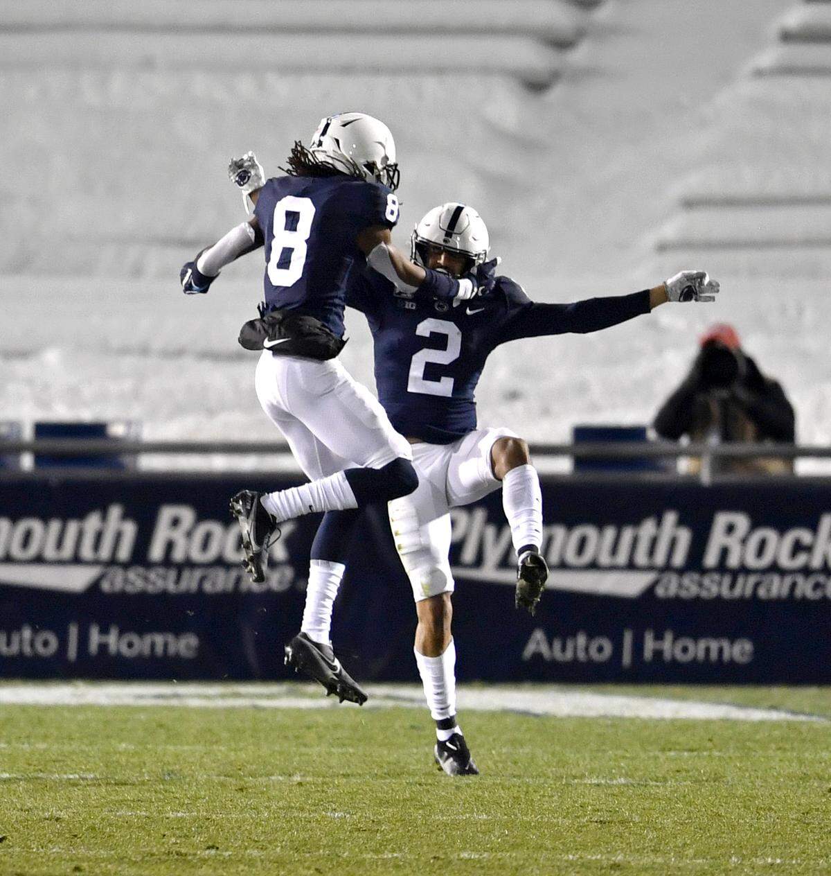 Penn State cornerback Keaton Ellis celebrates with Penn State cornerback Marquis Wilson during the game against Illinois on Saturday, Dec. 19, 2020 at Beaver Stadium.
