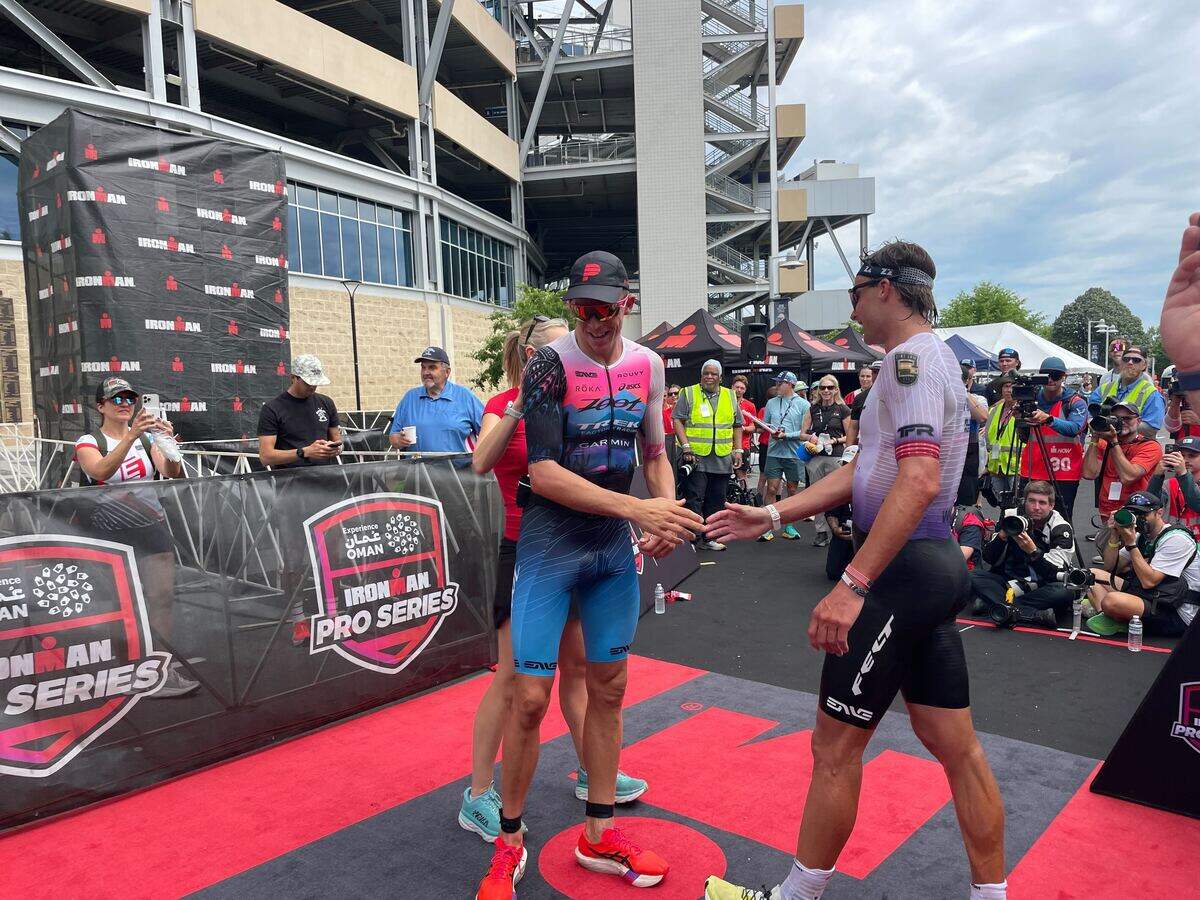 Top finishers Trevor Foley and Sam Long congratulate each other Sunday, June 14, 2026, at the Ironman 70.3 Pennsylvania Happy Valley North American Championship in Centre and Clinton counties.