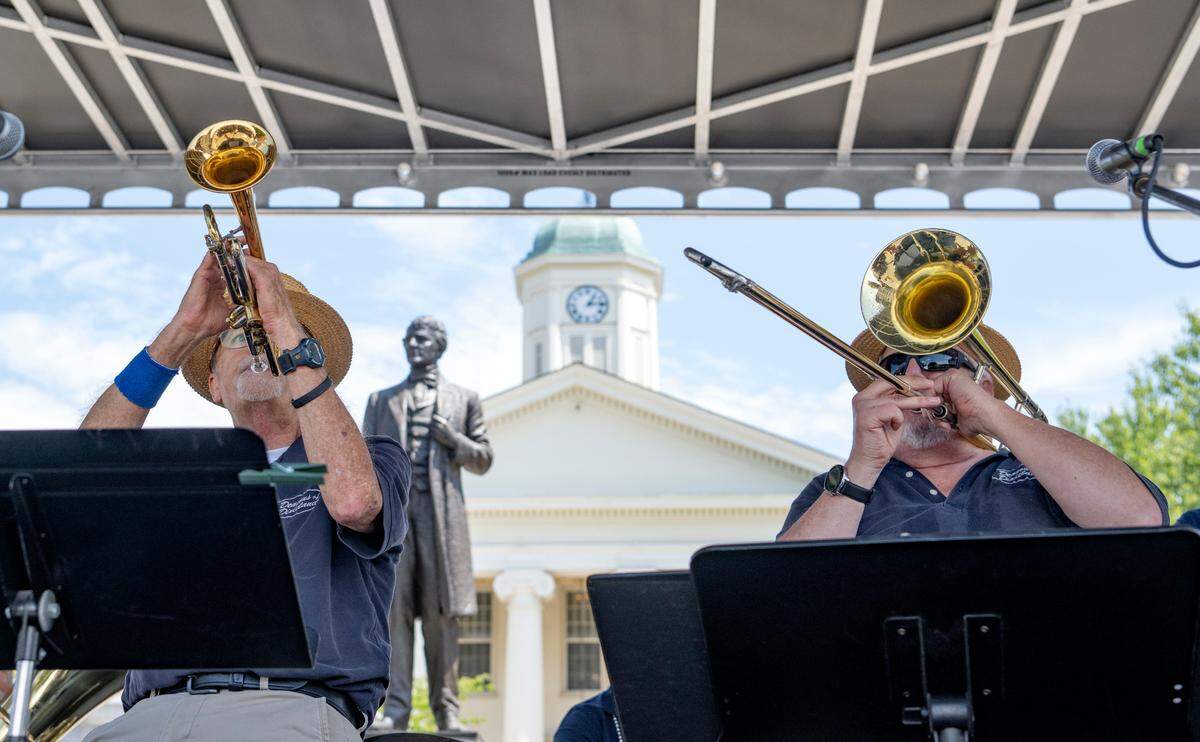 The Deacons of Dixieland entertain the crowd in front of the Centre County Courthouse during the 39th Annual Bellefonte Arts and Crafts Fair on Friday, Aug. 5, 2022.