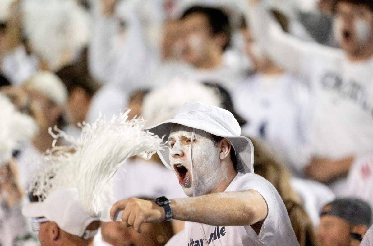 Penn State fans cheer during the White Out game against Minnesota on Saturday, Oct. 22, 2022.