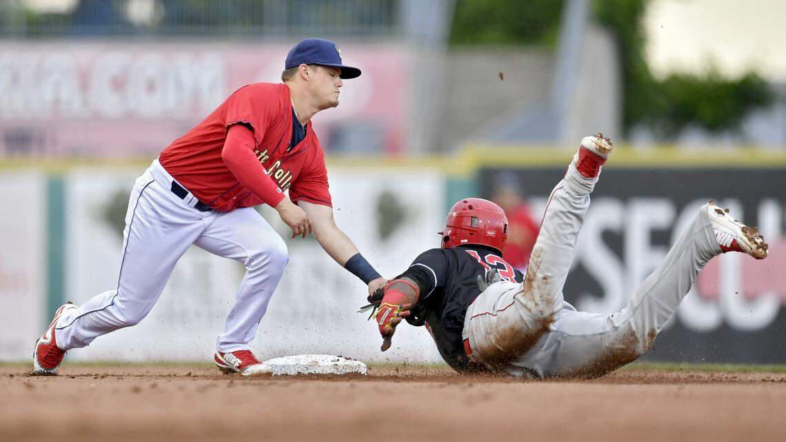 State College Spikes' Nick Dunn, seen tagging out Batavia's Albert Guaimaro, had a hit in 9 of his last 11 games before Thursday.
