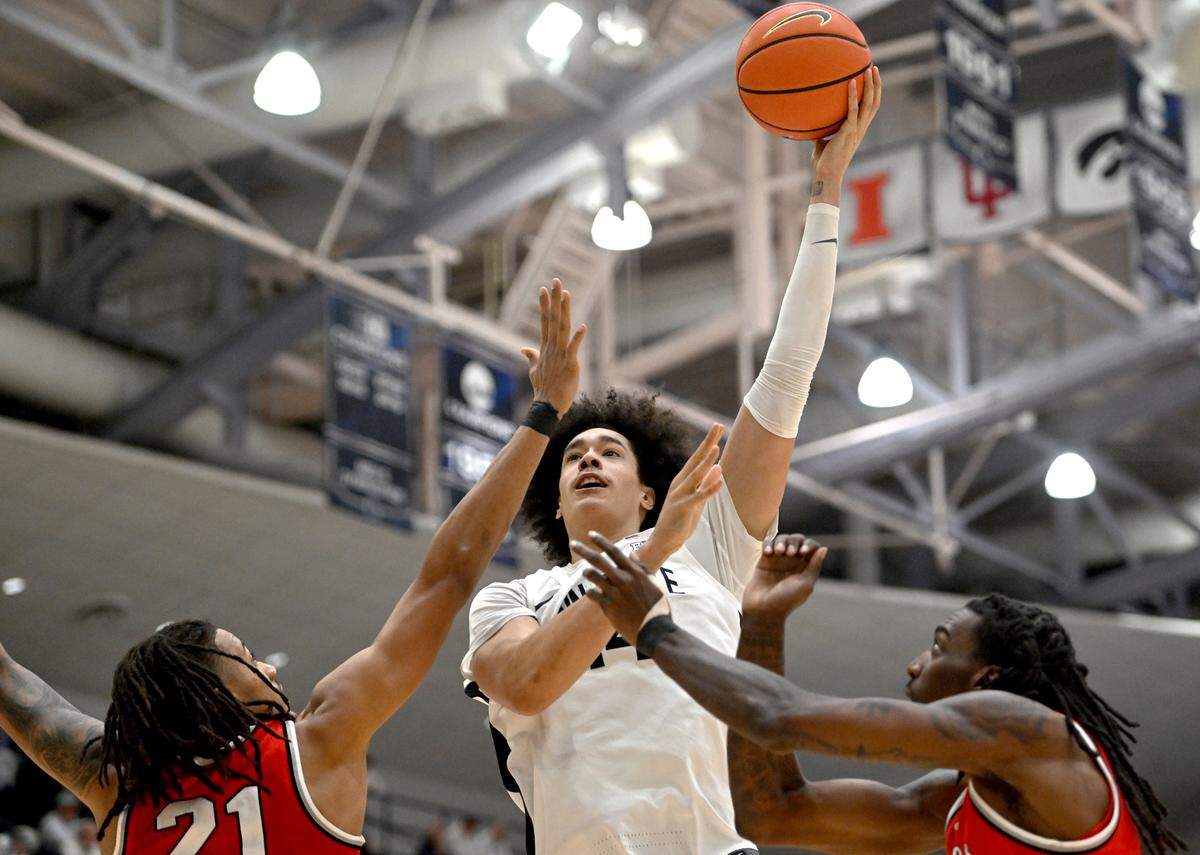 Penn State’s Yanic Konan Niederhauser shoots for a basket during the game against Ohio State on Thursday, Jan. 30, 2025 at Rec Hall.