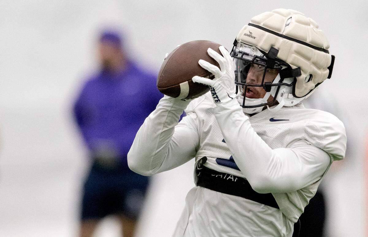 Penn State wide receiver Parker Washington makes a catch during practice on Wednesday, Oct. 26, 2022.