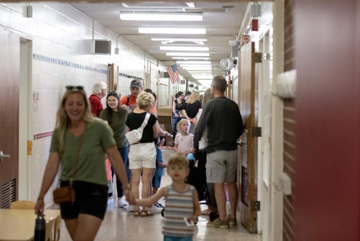 Community members walk the halls of Benner Elementary school during a farewell celebration on Monday, June 1, 2026.