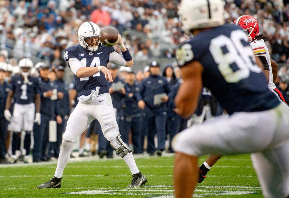 Penn State quarterback Sean Clifford makes a pass to tight end Brenton Strange for a touchdown during the game against Maryland on Saturday, Nov. 12, 2022.