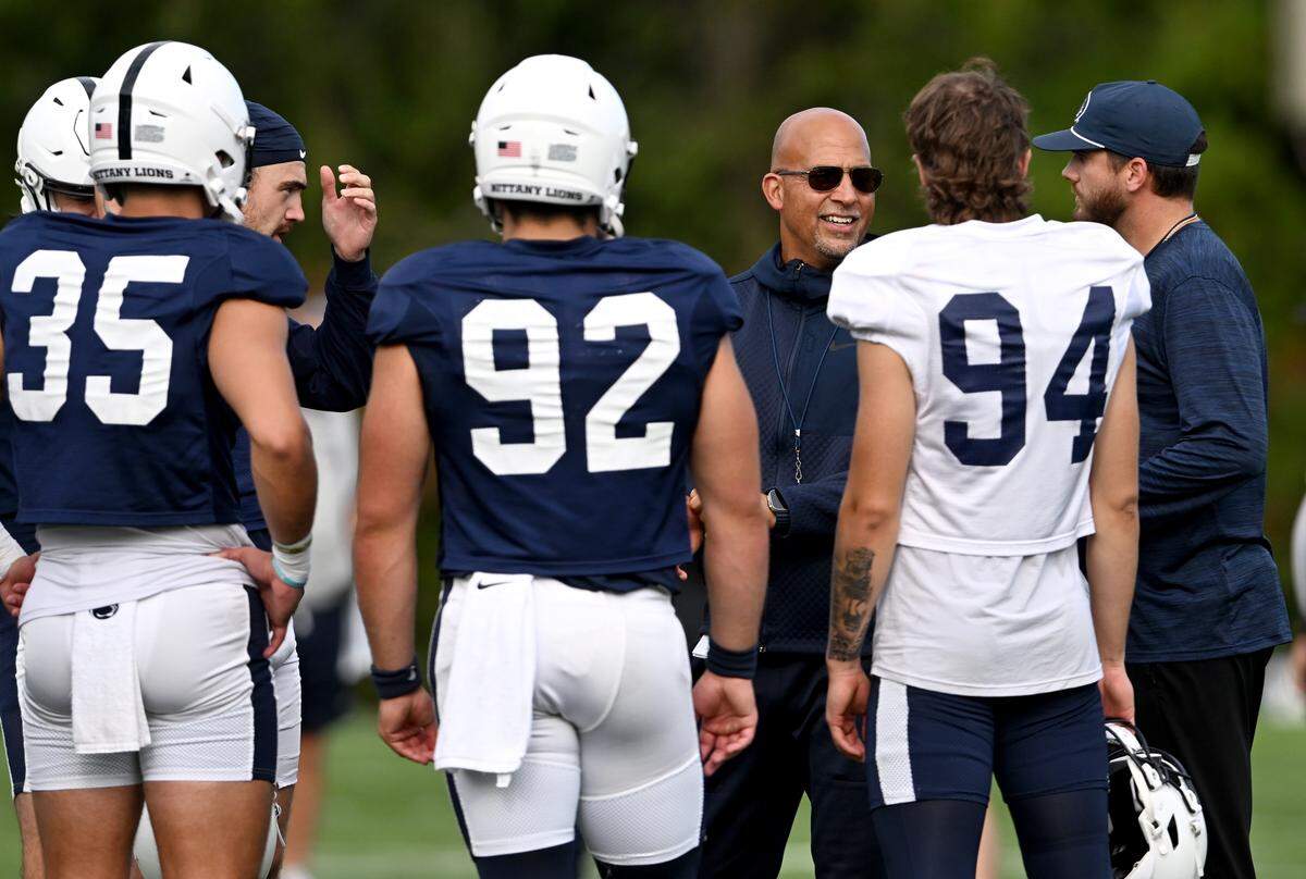 Penn State football coach James Franklin talks to the  kickers during practice on Wednesday, Sept. 10, 2025.  