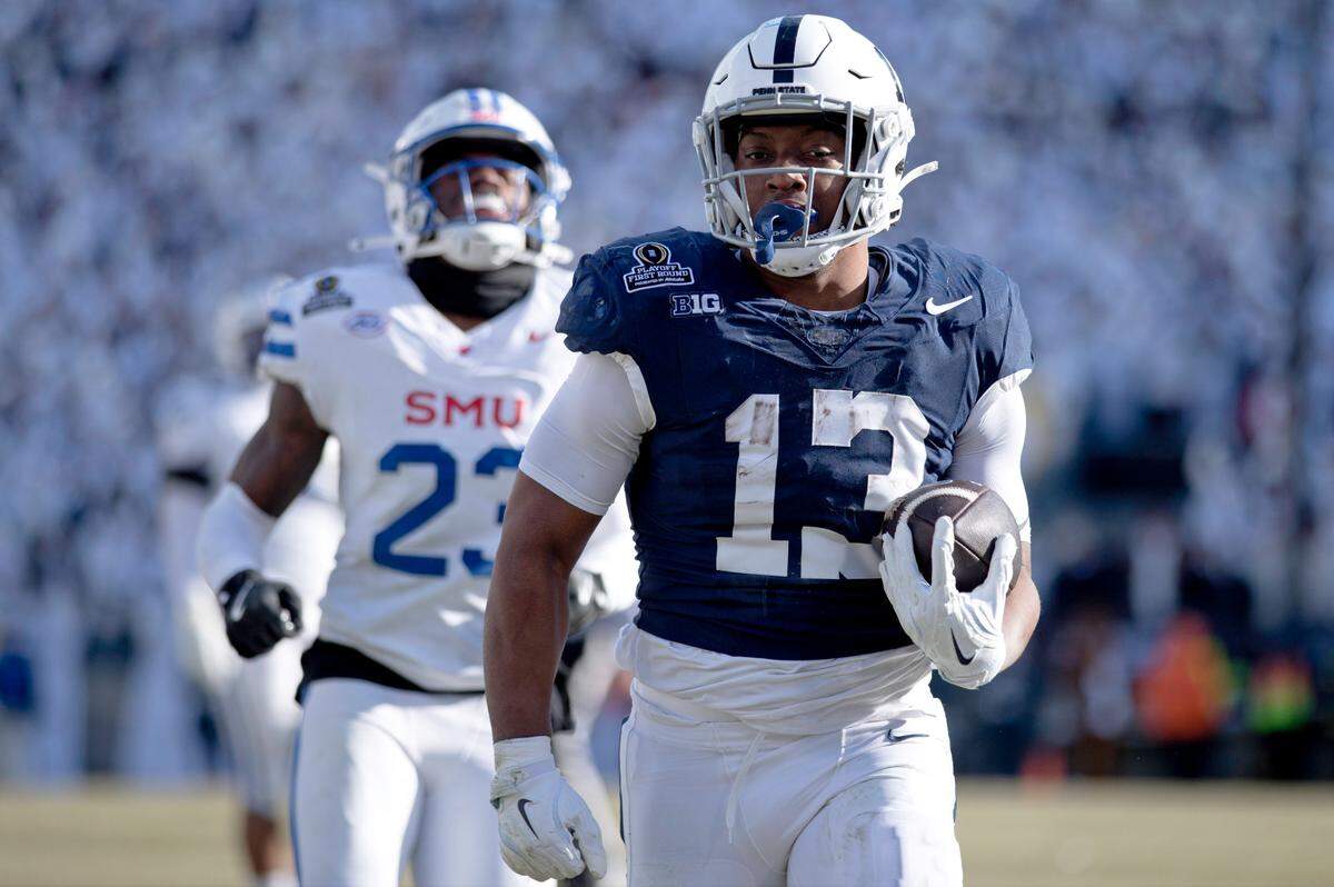 Penn State running back Kaytron Allen (13) runs the ball into the end zone for a touchdown during the college football playoff game against SMU at Beaver Stadium on Saturday, Dec. 21, 2024.