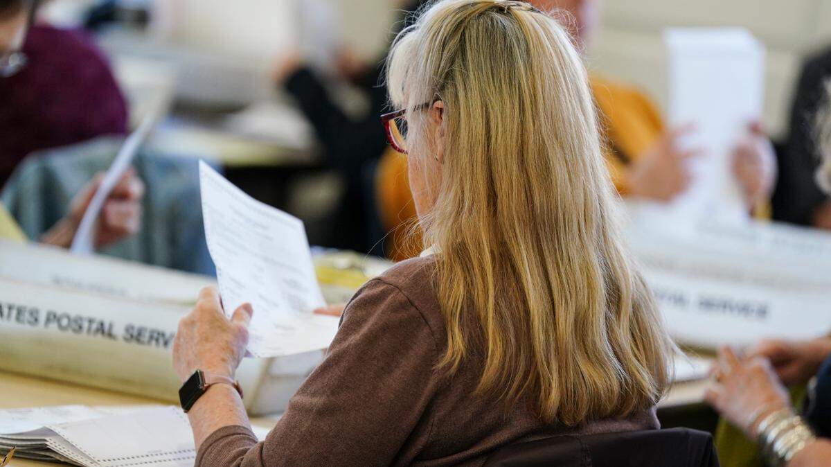 Workers sort mail-in ballots April 23, 2024, at Northampton County Courthouse in Easton, Pennsylvania.