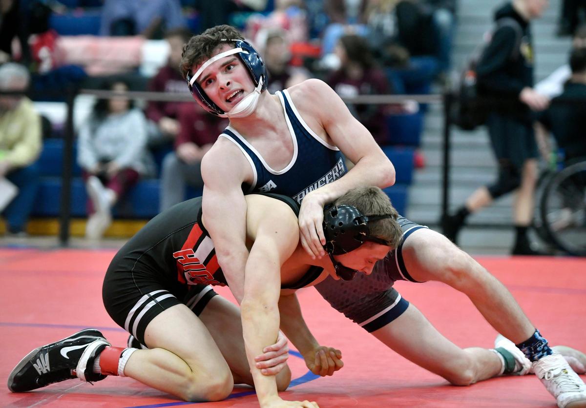Philipsburg-Oscoela’s Nick Coudriet wrestles Hickory’s Connor Saylor in a 113 lb quarterfinal bout at the West Branch Ultimate Warrior on Friday, Jan. 24, 2020. Saylor won by major decision, 12-4.