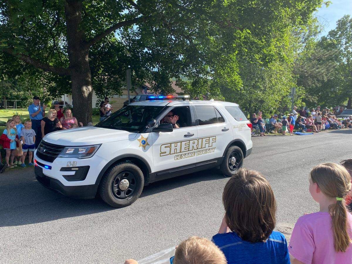 Centre County Sheriff Bryan Sampsel drives in the Boalsburg Fire Company’s parade on Saturday, May 27, 2023.