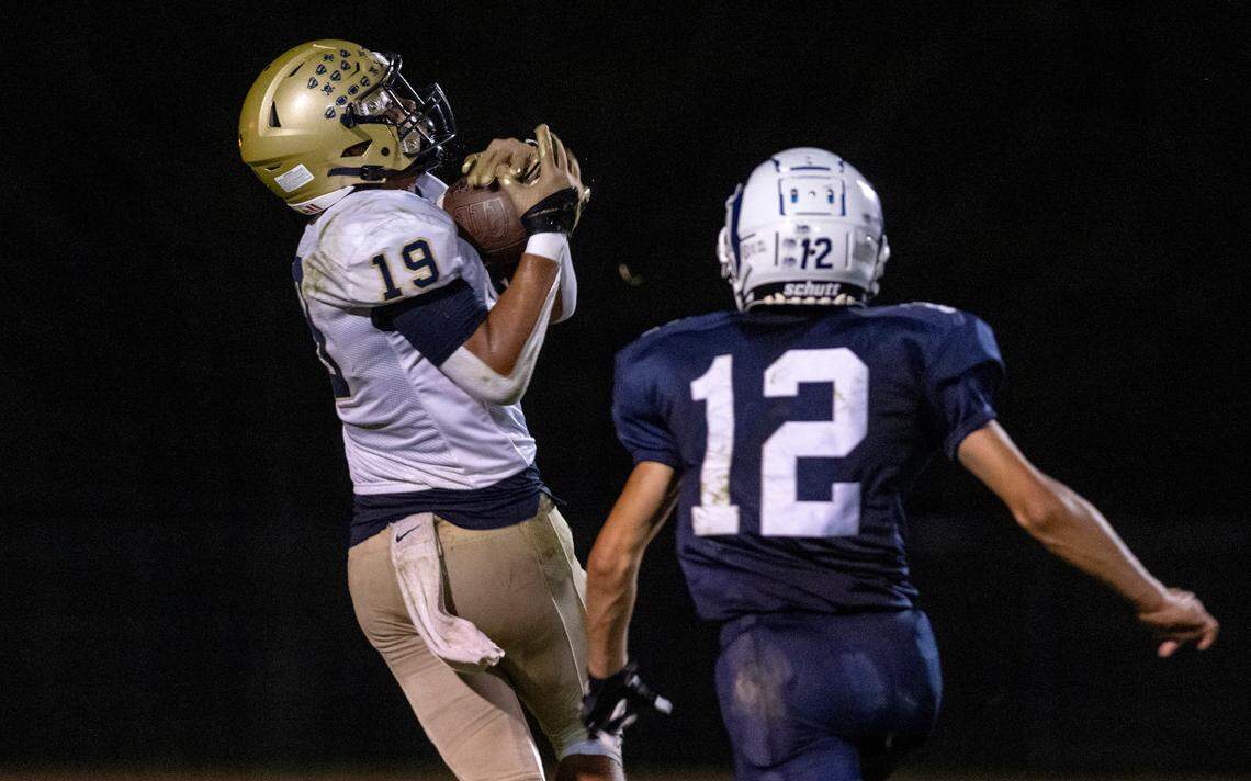 Bald Eagle Area’s Camron Watkins makes a catch ahead of a Penns Valley defender and runs it in for a touchdown during the game on Friday, Sept. 8, 2023.