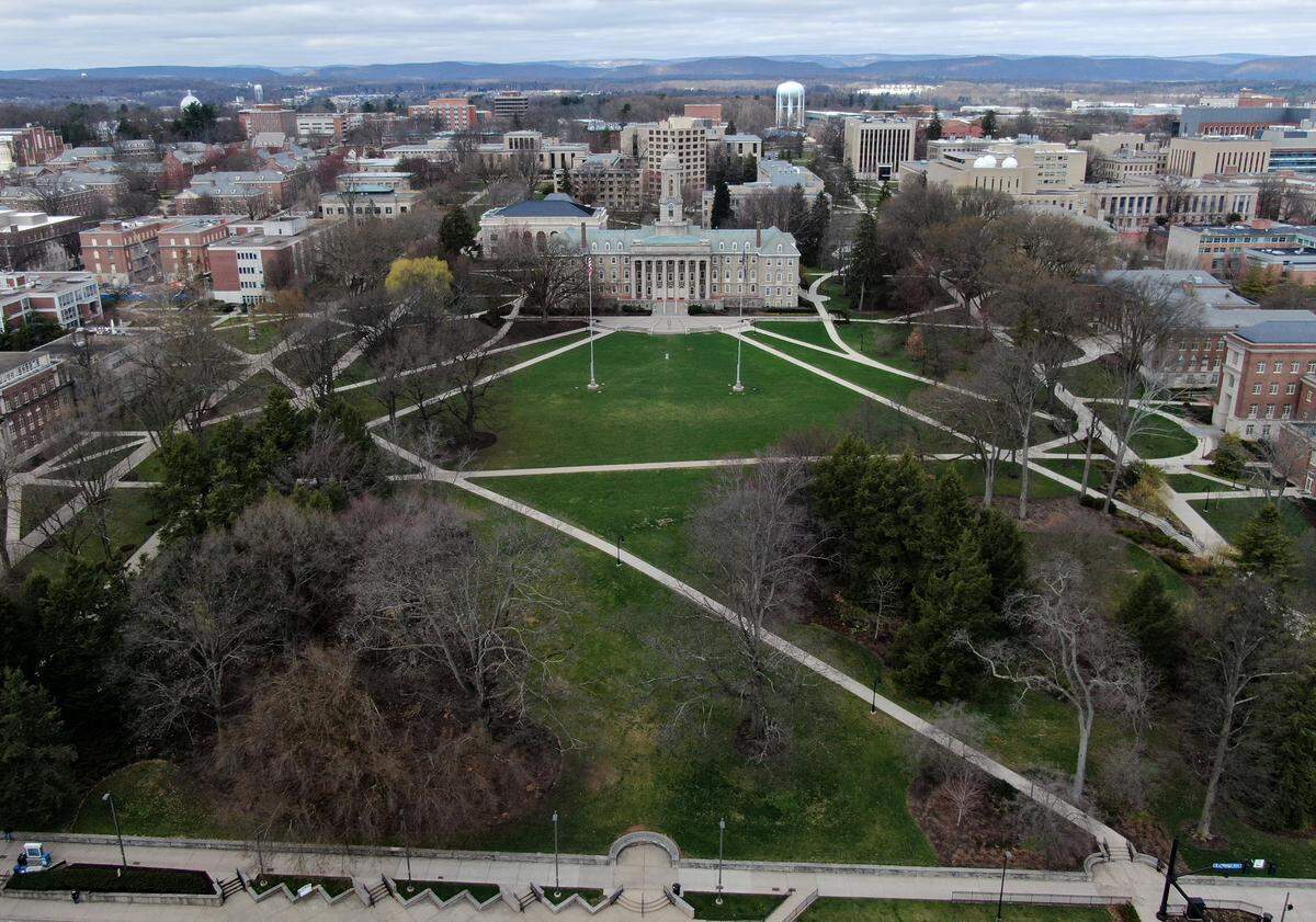 The walkways by Old Main on the Penn State campus are bare on March 24, 2020.