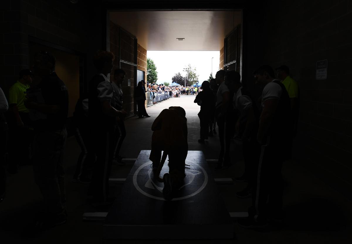 The Nittany Lion kneels down before going through the tunnel for team arrival Saturday, Sept. 15, 2018 at Beaver Stadium.