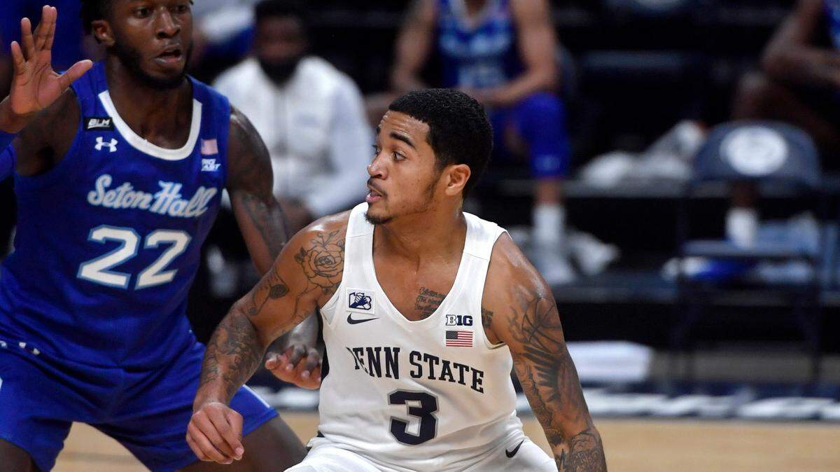 Penn State’s Sam Sessoms dribbles around Seton HallÕs Myles Cale during the game on Sunday, Dec. 6, 2020 at the Bryce Jordan Center.