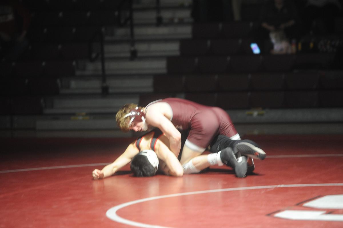 State College’s Hayden Cunningham controls Cumberland Valley’s Gordon Hung in their 133-pound bout of the Little Lions’ 40-29 loss on Wednesday, January 11, 2023. Cunningham took care of Hung, 10-2.