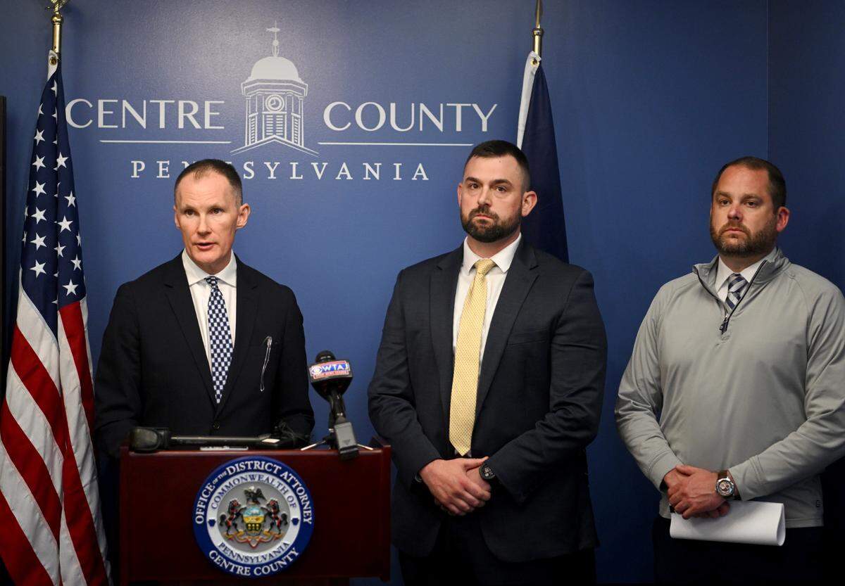 Centre County First Assistant District Attorney Sean McGraw announces on Tuesday, April 18, 2023, the arrest of a Michigan man for a July 2000 rape of a 19-year-old Penn State student jogging along the Penn State golf course. Next to McGraw is Penn State University police detective and lead investigator Nicholas Sproveri and interim Penn State University police Chief Wes Sheets.