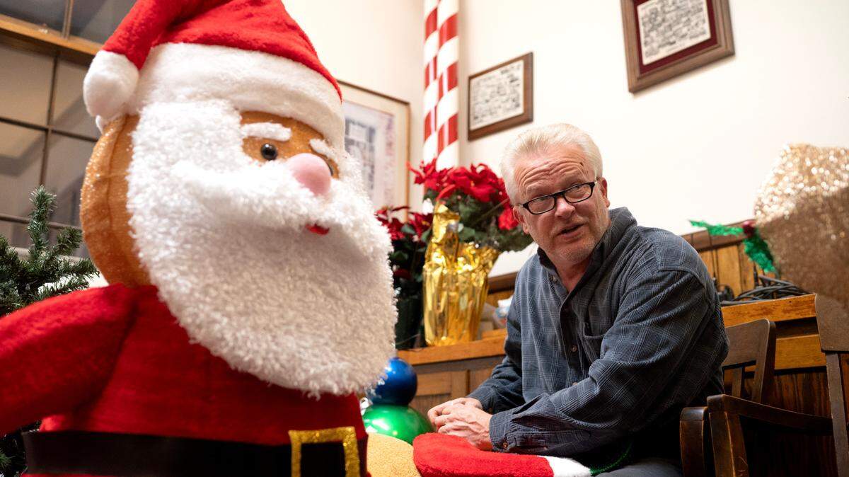 Dan Durachko repairs a Santa decoration at the Bellefonte Historical Railroad Society on Wednesday, Dec. 11, 2024.