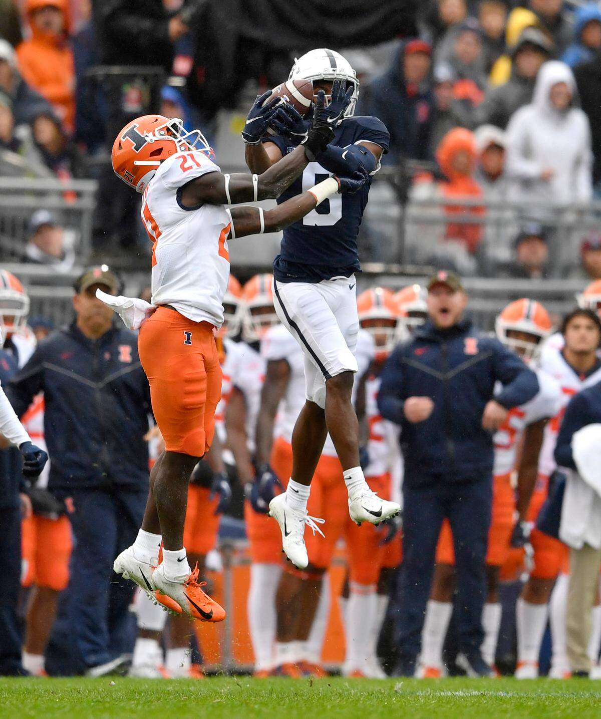 Penn State wide receiver Jahan Dotson makes a catch over IllinoisÕ Jartavius Martin during the game on Saturday, Oct. 23, 2021.
