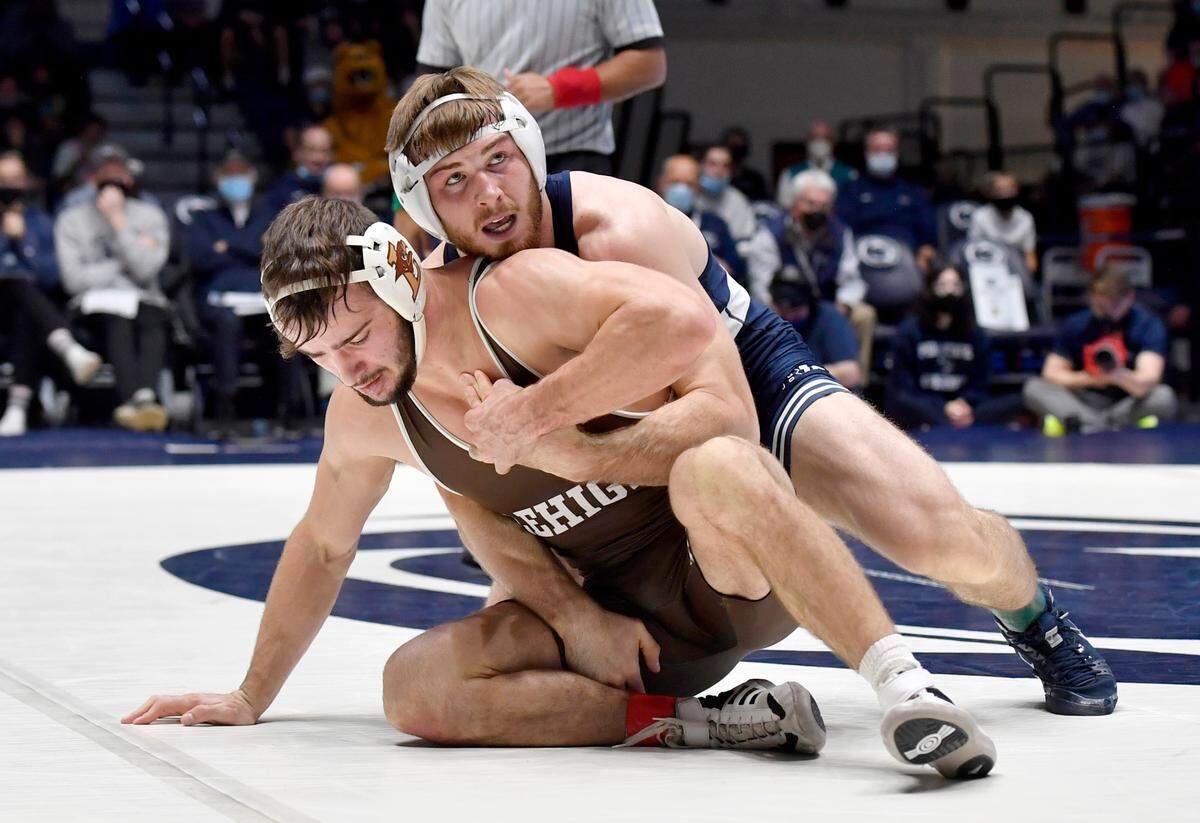 Penn StateÕs Creighton Edsell controls LehighÕs Brian Meyer in the 165 lb bout during the match on Sunday, Dec. 5, 2021 at Rec Hall. Penn State won, 23-16.
