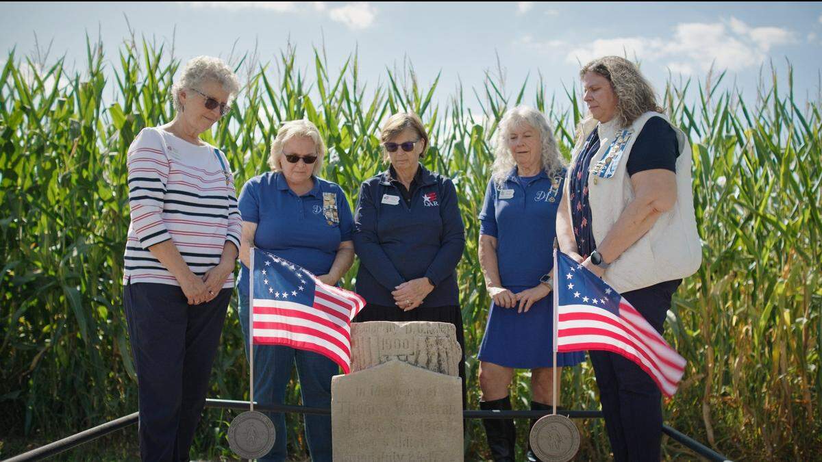 Members of the Bellefonte Chapter Daughters of the American Revolution are pictured at the memorial.